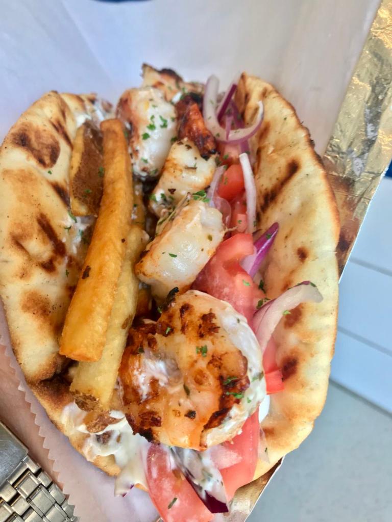 Shrimp Souvlaki Sandwich · Tender marinated, grilled Shrimp with herbs and spices.