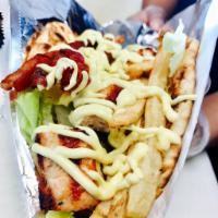 Kotobacon Sandwich · Chicken souvlaki on pita topped with bacon, lettuce, mustard mayo and french fries.