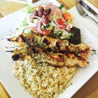 Chicken Souvlaki Platter  · 2 piece sticks of tender grilled all white meat chicken cubes seasoned with herbs.