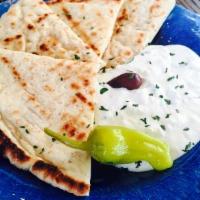 Tzatziki · Yogurt dip with cucumber, garlic and dill.