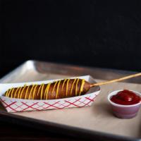 Corn Dog · House batter, served on a stick and yellow mustard.