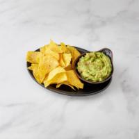 Guac and chips · Fresh Guacamole and chips