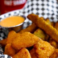 Mac N’ Cheese Bites · 6 pieces - served with buffalo ranch.