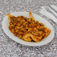 Chicken a la Marsala · Filets of chicken sauteed in mushroom in Marsala wine.