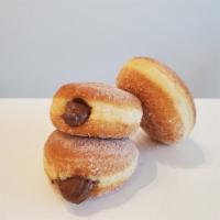 Nutella Filled · Cinnamon sugar round donut with Nutella filling.