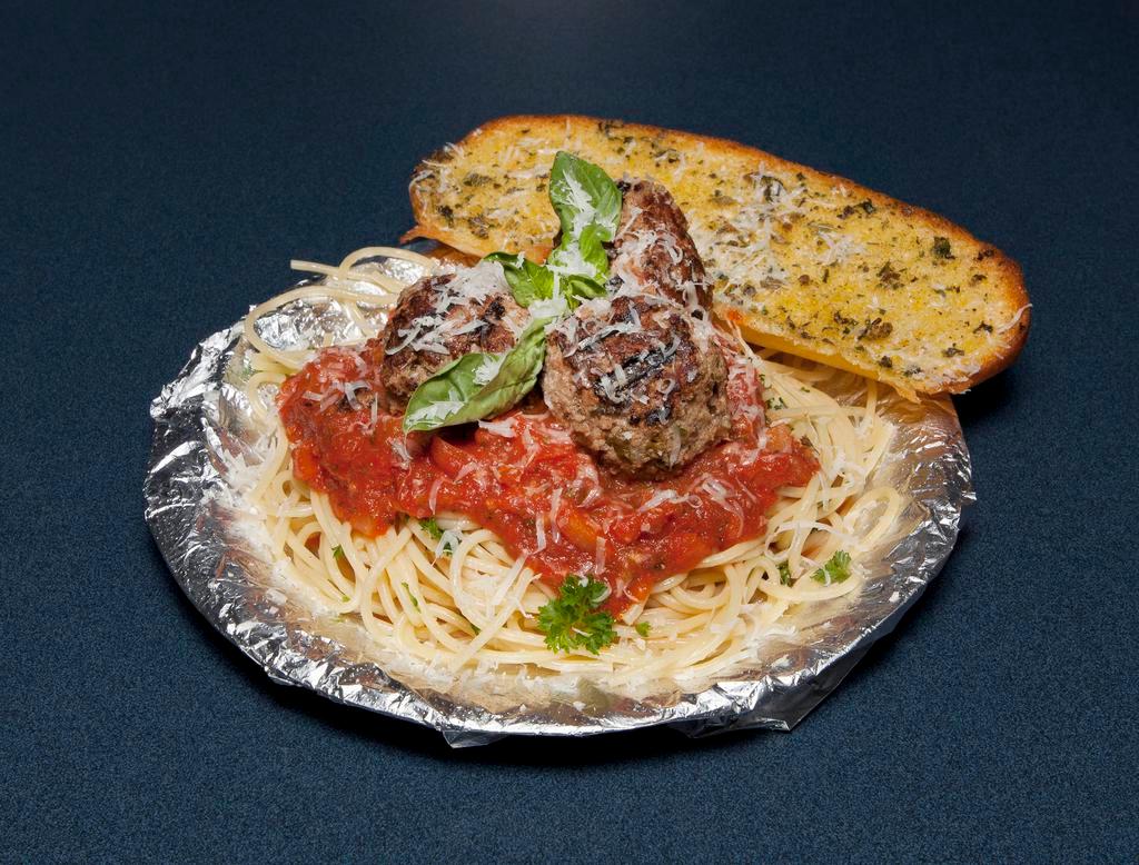 Spaghetti with Marinara · Homemade marinara sauce, spaghetti pasta and shaved Parmesan.