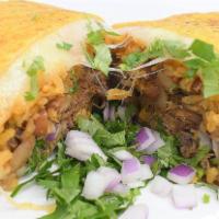 Burrito · Flour tortilla, cheese, rice and beans, birria, onions, cilantro.