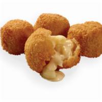 Mac and Cheese Bites  · Our crave-able Mac & Cheese Bites will have you coming back for more. You were warned.  