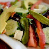 Salad el Maguey · Mixed greens, tomato, onions, avocado, cucumber, Mexican cheese and lettuce. Vegetarian.