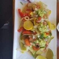 Vegetarian Tacos · Sauteed zucchini, carrot, mushrooms, peppers and onions. Served on a corn tortilla. (1 order...