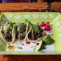 3x Steak Tacos · Shredded grilled steak with pico de gallo, sliced radish, and guacamole served on a corn tor...