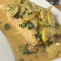 Salmon el Maguey · Sauteed wild salmon cooked with zucchini, onions, garlic, mushrooms, white wine, Mexican spi...