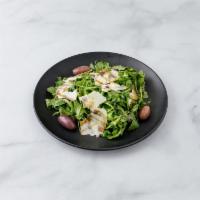 Arugula Salad · Shaved Parmigiano, red onions, lemon and oil with a balsamic glaze.