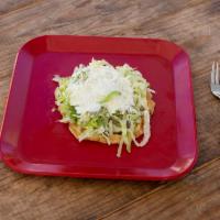 Sope · Served with 1 homemade tortilla with queso fresco, cilantro, onion, lettuce, sour cream and ...