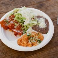 Enchilada Combo · Includes sour cream, lettuce, cheese. Served with rice and beans.