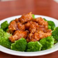 H11. General Tso's Chicken 左宗鸡 · Chunks of tender chicken deep fried till crispy in spicy sweet and sour on top of steamed br...
