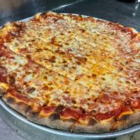 Bar Pie pizza · Crispy Thin crust, sauce and cheese to the edges, cut in squares!