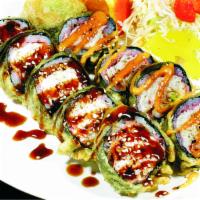 18. Sakura Roll · In: crabmeat, avocado, spicy tuna, and deep-fried. Sauce: eel, special.