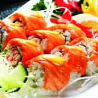 20. Baked Salmon Roll · In: crabmeat, avocado. Out: baked salmon. Sauce: eel, spicy mayo