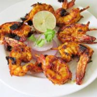 Tandoori Prawns · Jumbo prawns in a tangy pepper masala.