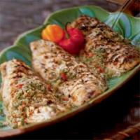 Fish Masala · Tender cod cooked with onions, peppers and fresh tomatoes seasoned with onion seeds and dry ...