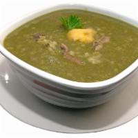 Aguadito de Pollo  · Peruvian coriander base rice soup.