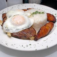Bistec a lo Pobre · Fried steak served with white rice, sweet plantain, french fries, and a fried egg.