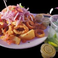 Jalea  · Crispy fried fish, shrimp, calamari, and cassava topped with creole salad.