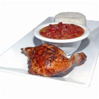 1/4 Pollo a La Brasa con Arroz y Frijoles · 1/4 chicken with rice and beans.