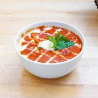 Butter Chicken · Chicken ccoked with mild spicy butter gravy made of onions, tomatoes, cashews, cream and mix...