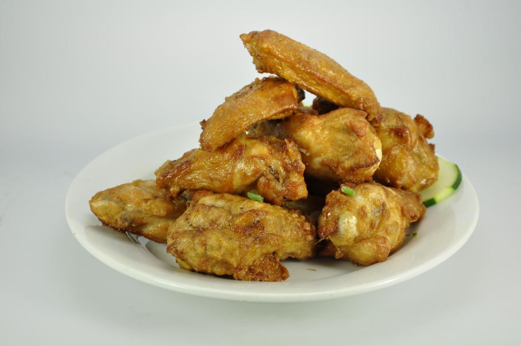 Chicken Wings · Pieces of fried wings. 