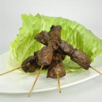Lamb Kebab · Grilled kebab in jerk seasoning. 