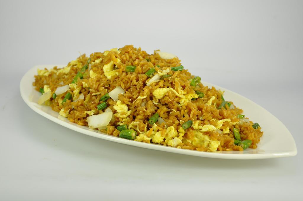 Plain Fried Rice · Fried rice with bora, onions and eggs. 