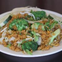 Vegetable Fried Rice · Broccoli, baby corn, onions, bora and snow peas. 