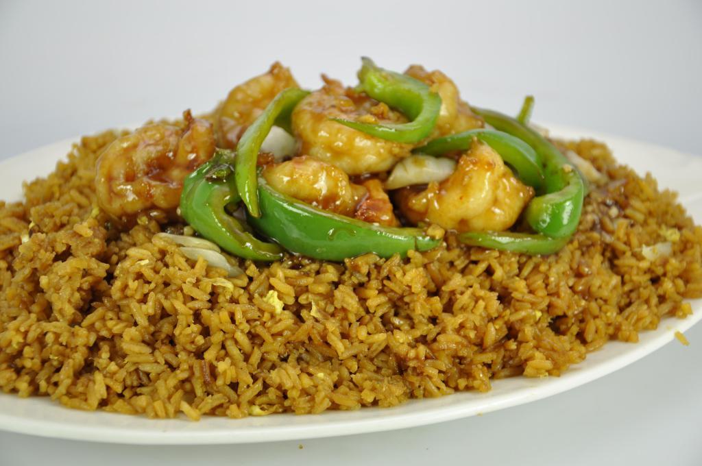 Pepper Shrimp Fried Rice · Jumbo shrimp on top of fried rice. 