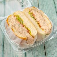 19. Tuna Meat Sandwich · Tuna, melted American cheese, grilled on whole wheat or white toast.