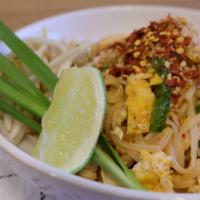 T9. American Chicken Pad Thai  · Egg, chive, bean sprout, peanuts, Pad Thai sauce, and lime.