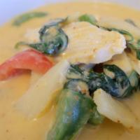 T21. Chicken Green Curry · Authentic Thai green curry with bamboo shoots, eggplant, bell pepper, and basil.