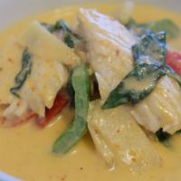 T22. Chicken Red Curry · Authentic Thai red curry with bamboo shoot, eggplant, bell pepper, and basil.