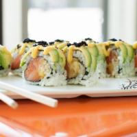 Ridgewood Special Roll · Salmon, fresh pineapple, and crunch topped with avocado and black caviar with manfo sauce.