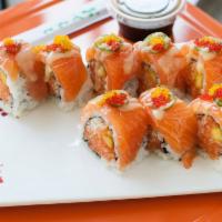 Golden Eye Special Roll · Crunchy spicy salmon and mango topped with salmon, jalapeno, red, and yuzu caviar with miso ...