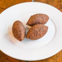 Kibbeh each ·  stuffed with ground beef, onions, & peanuts