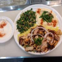 Chicken Shawarma Platter · chicken, rice, salad, garlic sauce, & bread