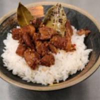 Pork Adobo · Pork belly marinated in a house adobo sauce and slowly simmered.