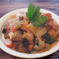 13. Eggplant with Sauce  · Cube of eggplant, tomatoes, peppers and garlic.