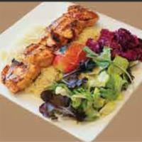 33. Chicken Shish · Tender chuncks of chicken marinated with blend of herbs, spices  served with rice and salad.