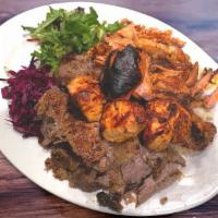 41. Mix Grill · Lamb gyro, chicken gyro, chicken shish kebab, lamb Adana,  lamb chop served with rice and sa...
