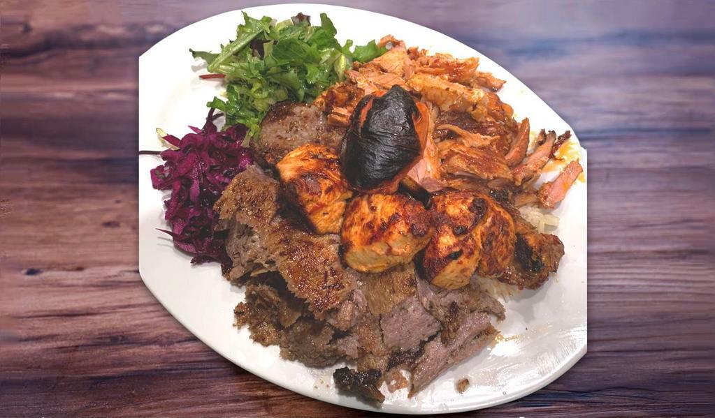 41. Mix Grill · Lamb gyro, chicken gyro, chicken shish kebab, lamb Adana,  lamb chop served with rice and salad.