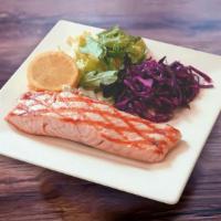 49. Grilled Salmon · Char-grilled filet of salmon  served with rice and salad.