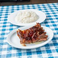 Rice, Beans with Ribs · A cut of meat including the rib. 